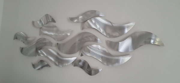 Rip Tide Metal Wall Sculpture with Abstract Tropical Wave Design by Brian  Jones